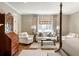 Main bedroom sitting area with comfortable sofas and coffee table at 3674 Kingsboro Ne Rd, Atlanta, GA 30319