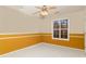 Bright bedroom with large window and painted walls at 415 Rockingham Ln, Woodstock, GA 30189