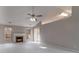 Living room with fireplace and vaulted ceiling at 415 Rockingham Ln, Woodstock, GA 30189