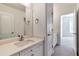 Bathroom with vanity, mirror, and additional cabinets at 5506 Sara Creek Ln, Sugar Hill, GA 30518