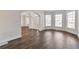 Bright dining room with hardwood floors and bay windows at 5506 Sara Creek Ln, Sugar Hill, GA 30518