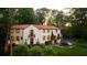 Luxury home nestled on a lush, tree-lined property at 1598 W Sussex Ne Rd, Atlanta, GA 30306