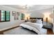 Bright bedroom with king-size bed and hardwood floors at 1598 W Sussex Ne Rd, Atlanta, GA 30306