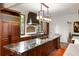 Gourmet kitchen with island, custom cabinetry, and high-end appliances at 1598 W Sussex Ne Rd, Atlanta, GA 30306