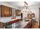 Open kitchen with breakfast nook, custom cabinetry, and expansive countertops at 1598 W Sussex Ne Rd, Atlanta, GA 30306