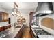 Gourmet kitchen with island, custom cabinetry, and high-end appliances at 1598 W Sussex Ne Rd, Atlanta, GA 30306