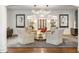 Elegant living room with hardwood floors, comfortable seating, and statement art at 1598 W Sussex Ne Rd, Atlanta, GA 30306