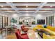 Elegant living room with a coffered ceiling, large windows, and a view of the backyard at 1598 W Sussex Ne Rd, Atlanta, GA 30306