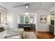 Main bedroom showcasing a large bed, gray built-ins, and hardwood floors at 1598 W Sussex Ne Rd, Atlanta, GA 30306