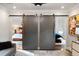 Playroom with gray barn doors leading to bedrooms at 1598 W Sussex Ne Rd, Atlanta, GA 30306