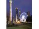 Night view of Atlanta's Centennial Olympic Park featuring the SkyView Ferris wheel, skyscrapers, and illuminated landmarks at 1598 W Sussex Rd, Atlanta, GA 30306