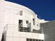 Modern white building featuring curved architecture, railings, and symmetrical geometric design at 1598 W Sussex Rd, Atlanta, GA 30306