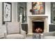 Close-up view of a fireplace surrounded by stylish decor and furniture at 1598 W Sussex Rd, Atlanta, GA 30306