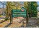 Morningside Nature Preserve sign, surrounded by lush greenery, inviting nature lovers at 1598 W Sussex Rd, Atlanta, GA 30306