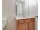 Clean bathroom with wood vanity and a single sink at 53 Providence Oak Ct, Lawrenceville, GA 30046