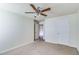 Bedroom with ceiling fan and closet at 53 Providence Oak Ct, Lawrenceville, GA 30046