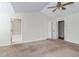 Spacious bedroom with carpet flooring and ceiling fan at 53 Providence Oak Ct, Lawrenceville, GA 30046