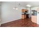 Spacious dining area with hardwood floors and chandelier at 53 Providence Oak Ct, Lawrenceville, GA 30046