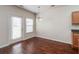 Bright dining area with hardwood floors and access to patio at 53 Providence Oak Ct, Lawrenceville, GA 30046