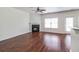 Spacious living room with fireplace and hardwood floors at 53 Providence Oak Ct, Lawrenceville, GA 30046