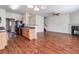 Open concept living area with hardwood floors and fireplace at 53 Providence Oak Ct, Lawrenceville, GA 30046