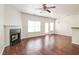 Spacious living room featuring a fireplace and hardwood floors at 53 Providence Oak Ct, Lawrenceville, GA 30046