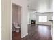 Small powder room with toilet and pedestal sink at 53 Providence Oak Ct, Lawrenceville, GA 30046