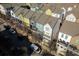 Aerial view of colorful townhouses with street access and private balconies at 711 Needletail Way, Atlanta, GA 30312