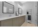 Bathroom with double sink vanity, white countertop and tiled floors at 711 Needletail Way, Atlanta, GA 30312