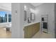 Bright bathroom featuring a double sink vanity and a stand up shower at 711 Needletail Way, Atlanta, GA 30312