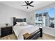 Bedroom with hardwood floors and ceiling fan at 711 Needletail Way, Atlanta, GA 30312