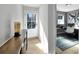 Bright entryway with wood console table and office at 711 Needletail Way, Atlanta, GA 30312