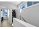 Upper level laundry room with full-size washer and dryer at 711 Needletail Way, Atlanta, GA 30312