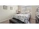 Charming bedroom with a comfortable bed and bench at 105 Couch Ct, Fayetteville, GA 30214