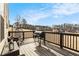 Deck overlooking backyard with grill and seating at 105 Couch Ct, Fayetteville, GA 30214