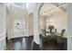 Elegant dining room with hardwood floors and a glass-top table at 105 Couch Ct, Fayetteville, GA 30214