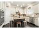 Spacious kitchen with granite countertops, stainless steel appliances, and an island at 105 Couch Ct, Fayetteville, GA 30214