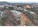 Aerial view of new townhome development with surrounding greenery at 163 Bluffington Way, Marietta, GA 30066