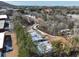 Aerial view of new homes under construction in a wooded community at 163 Bluffington Way, Marietta, GA 30066