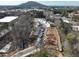 Aerial view showcasing new homes and ongoing construction in a quiet neighborhood at 163 Bluffington Way, Marietta, GA 30066