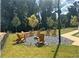 Relaxing community fire pit area with wooden chairs at 163 Bluffington Way, Marietta, GA 30066