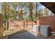 Private backyard with gravel ground cover and wooden fence at 2335 Mason Dr # D27, Atlanta, GA 30316