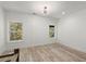 Bonus room featuring wood flooring and wall paneling at 2335 Mason Dr # D27, Atlanta, GA 30316