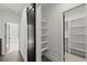 Hallway with barn door and built-in shelving at 2335 Mason Dr # D27, Atlanta, GA 30316