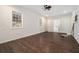 Spacious bedroom with dark wood flooring and access to bathroom at 1189 Rock Cut Rd, Forest Park, GA 30297