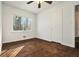 Simple bedroom with hardwood floors and ample natural light at 1189 Rock Cut Rd, Forest Park, GA 30297