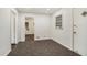 Simple dining area with new carpeting and access to other rooms at 1189 Rock Cut Rd, Forest Park, GA 30297