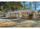 Ranch house with a yard and trees, newly renovated at 1189 Rock Cut Rd, Forest Park, GA 30297