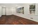 Spacious living room featuring hardwood floors and large windows at 1189 Rock Cut Rd, Forest Park, GA 30297
