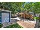 Home's backyard, showcasing a deck, detached garage, and a side yard at 609 Old Wheat Ne St, Atlanta, GA 30312